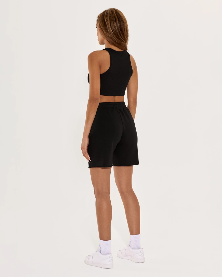 Cropped top with sporty cut and open shoulders