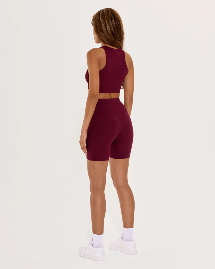 Cropped top with sporty cut and open shoulders