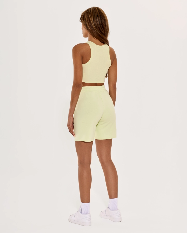 Cropped top with sporty cut and open shoulders