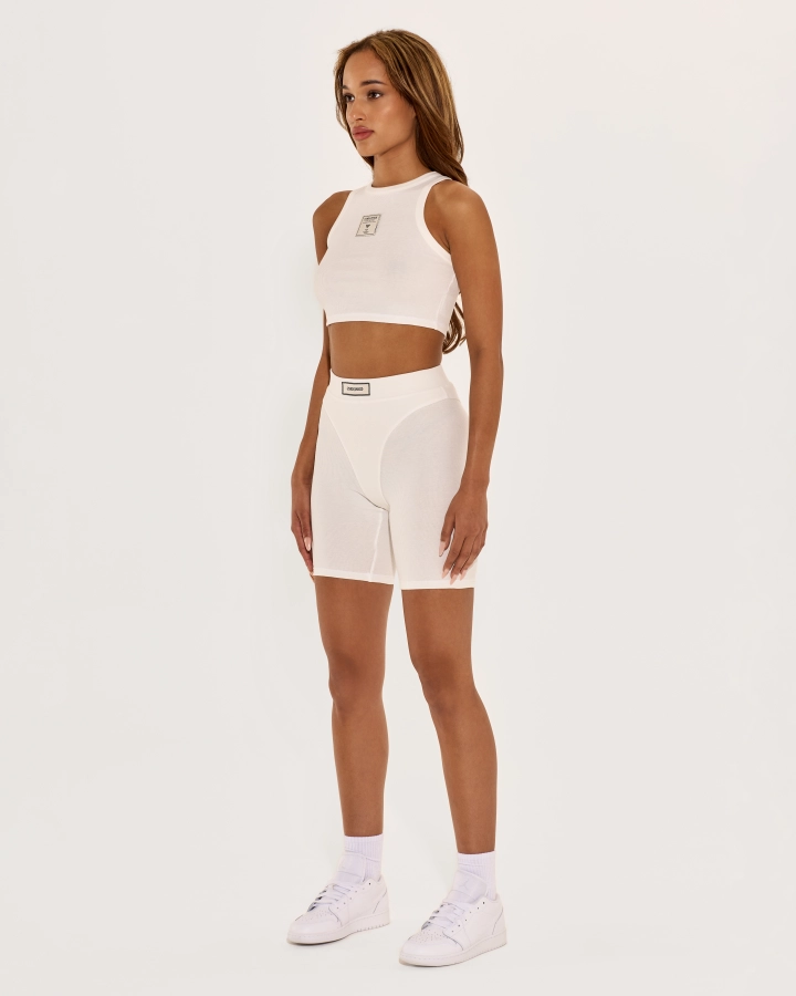 Cropped top with sporty cut and open shoulders