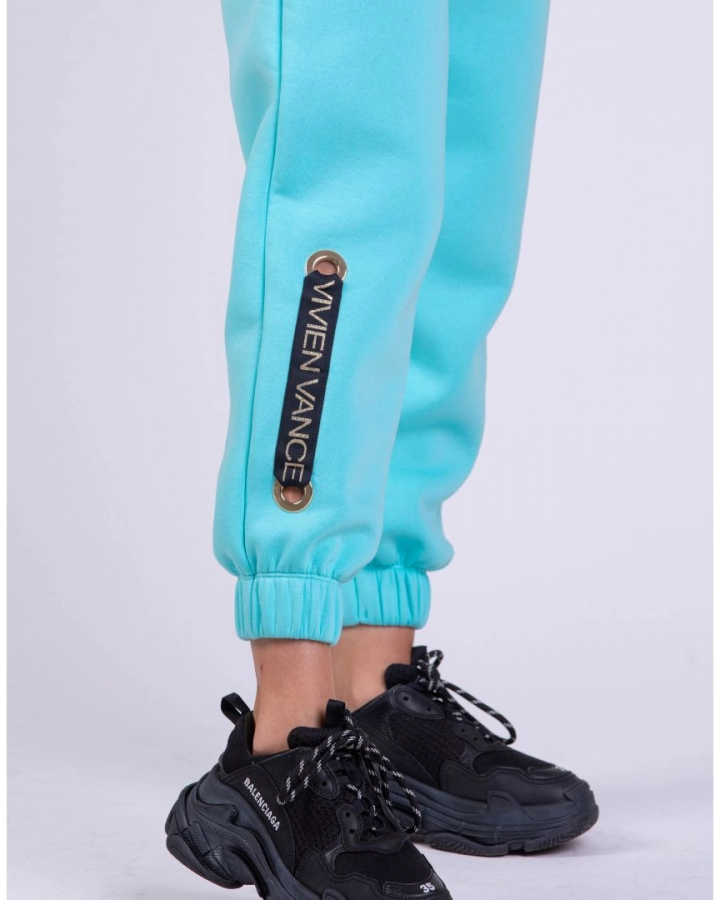 Sweatpants with branded strap