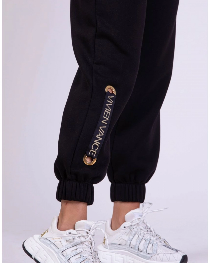 Sweatpants with branded strap
