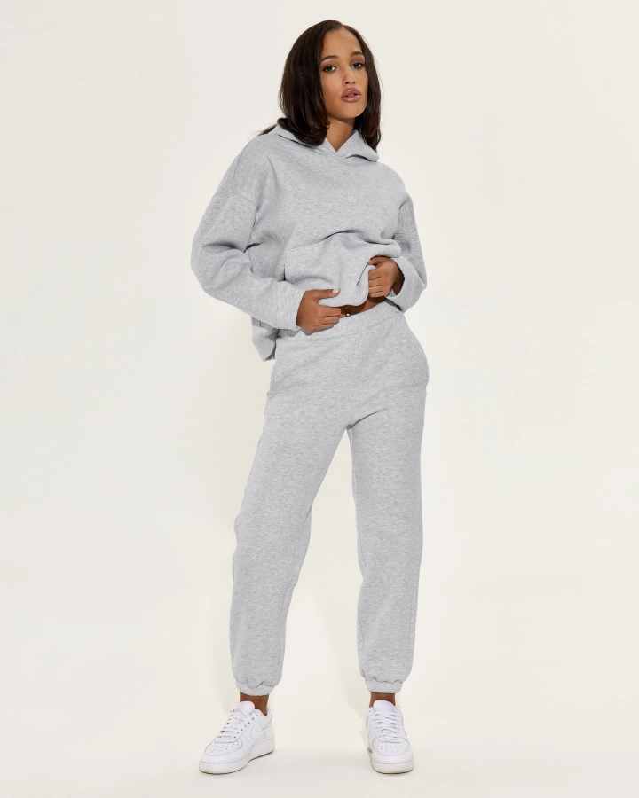 Relaxed fit joggers with elastic waist and gold embroidery
