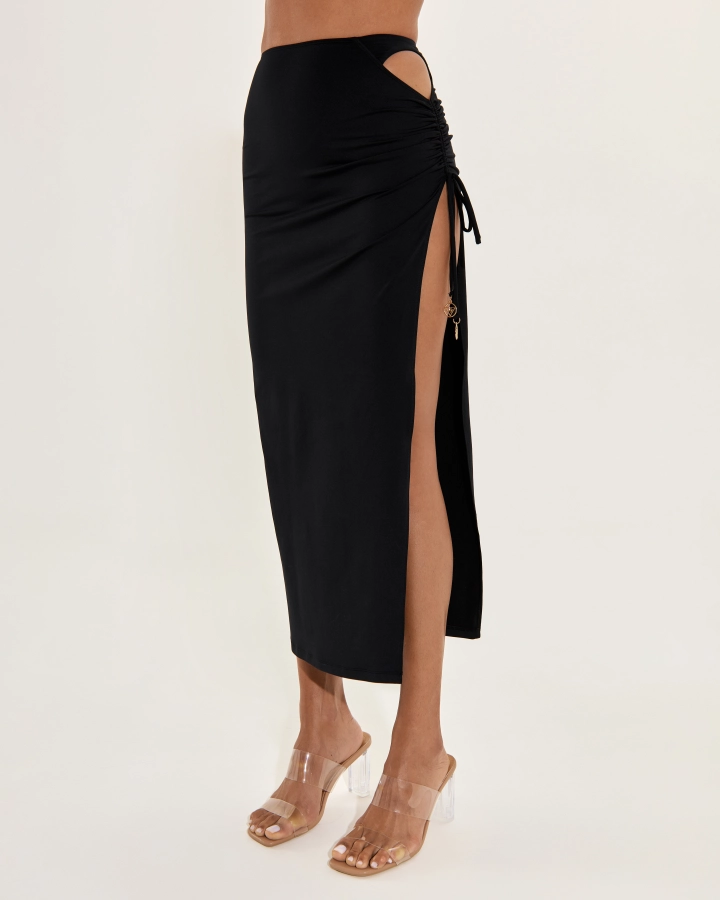 High-slit maxi skirt with ruched side and gold logo