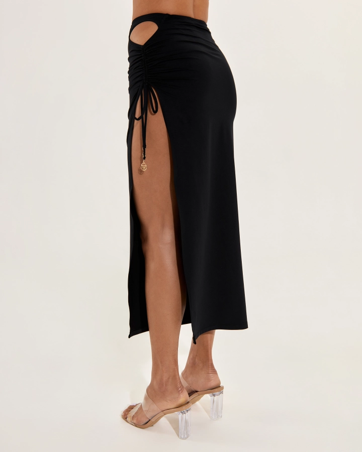 High-slit maxi skirt with ruched side and gold logo